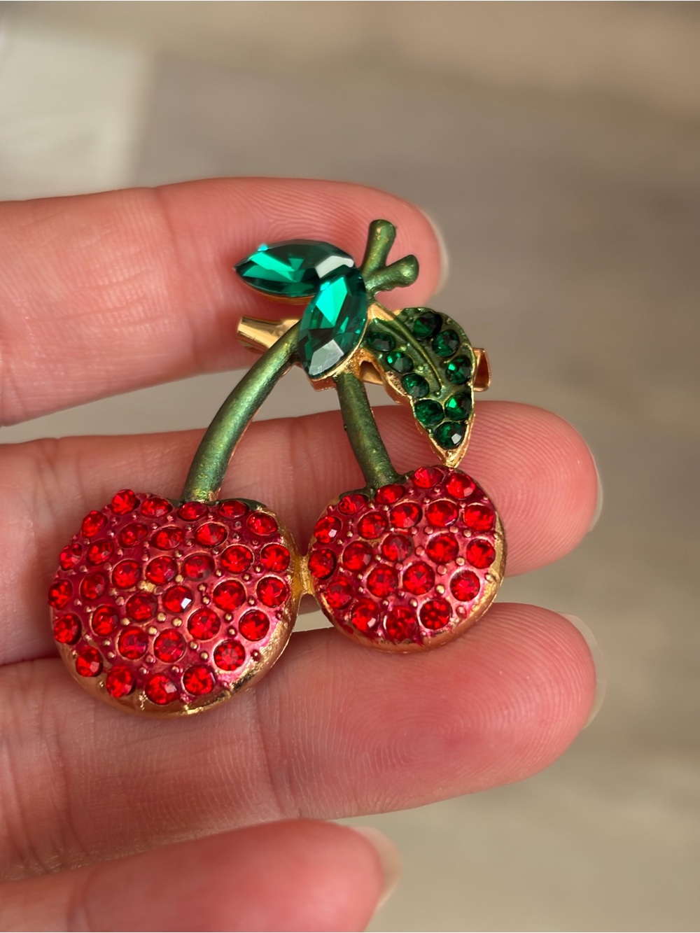 4/$50 Gold-Tone Red Crystal Cherry Brooch with Green Accents